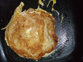 继续用筷子翻动