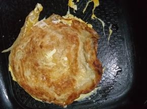 继续用筷子翻动