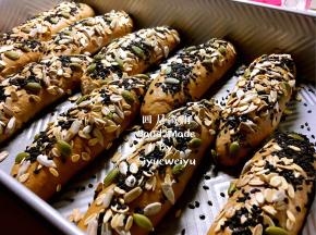 粘上谷物南瓜籽、葵花籽、燕麦片、黑芝麻。
