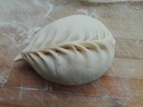 包起来，一个大包子完成
