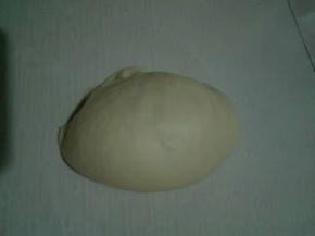 再次对折，捏紧