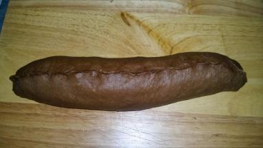 10. 自上而下卷起，捏紧收口；