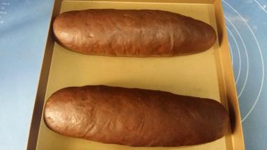 11. 放入不沾烤盘上，盖上保鲜膜，放温暖片发酵至两倍大；