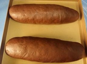 11. 放入不沾烤盘上，盖上保鲜膜，放温暖片发酵至两倍大；