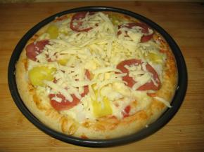 撒上剩余的芝士，重新放入烤箱，烤5分钟，芝士融化就可以