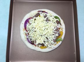 最后再撒上一层马苏里拉芝士碎。