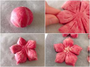 静置好的长条面团滚成圆，压扁，包上豆沙馅，压扁。切五刀，中间再划几刀。然后旁边用手捏起来，做成小花瓣的样子，还蛮简单的，就是豆沙会粘手，注意餐巾纸擦一擦。
花中间刷上蛋液，撒上白芝麻。