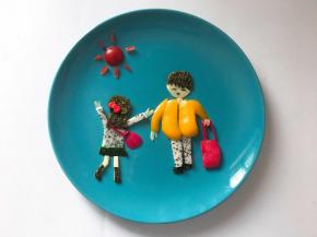 修饰好边角，小番茄做成太阳做装饰。