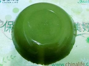 从容器中扣出。