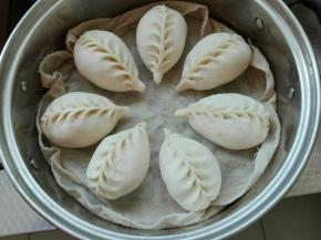 冷水上锅，大火烧开，转中火18分钟（视所做包子大小来定），关火焖5分钟