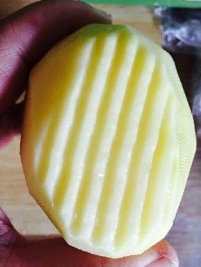 用工具竖着擦一下。