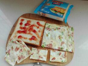 取另一片土司片抹番茄酱