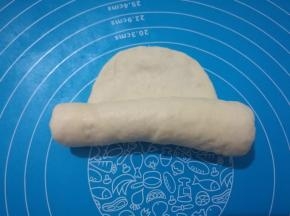 自下而上卷起。