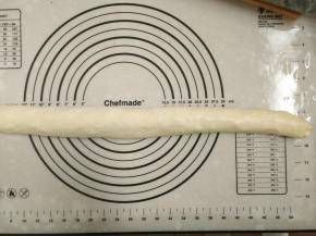 8.从上往下卷起来，一定要收紧口