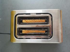 吐司片烤好以后会自动弹出来