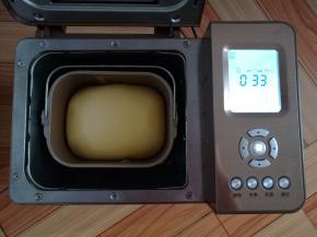 面团发酵到面包桶的8分满，自动进入烘烤模式