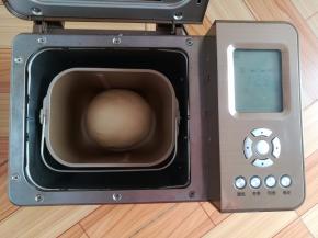 收圆一下面团，让面团进行第一次发酵