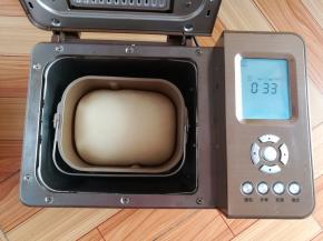 面团发酵到面包桶的8分满，自动进入烘烤模式