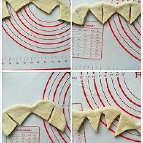 切开后再分开拉平，再从中间切开不切断。拉开再分别切开，即分成8个。全部切好后拉成一个圆形