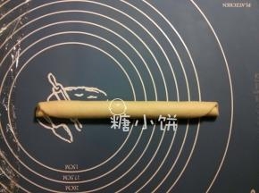 顺长的那一侧卷起来
