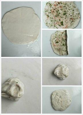 分成自己需要的大小，我分了六份，取一份擀开表面抹油，上面撒上适量盐，葱花，香豆面，红花，从上往下卷起，按扁，