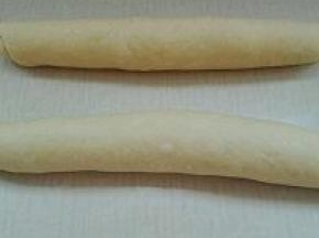 7. 自上而下卷起，搓长