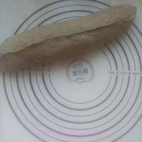 卷起来压紧收口。反面放在温暖处发酵。