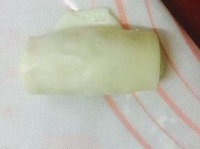 由上至下再次卷起来，收口朝下