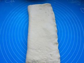 右边向左这过来三分之一，左边再向右边折过来。