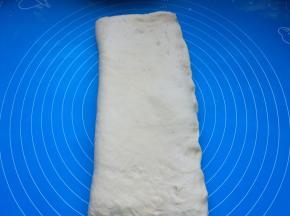 右边向左这过来三分之一，左边再向右边折过来。