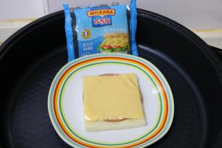 再放一片芝士片