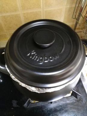 盖上盖子，准备烤红薯。