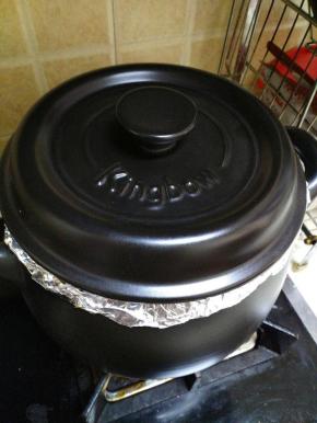 烤了24分钟后，关火后焖12分钟（让红薯在砂锅的余温下熟透。）