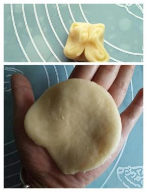 取一个面团两头捏紧，然后按扁