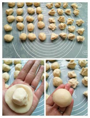 水油皮和油稣分成20份，取一个油皮，按扁，包入一个油稣；收口捏紧，朝下