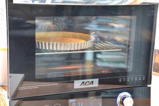 再重新放入烤箱中，按“启动”键，直到烘烤完成