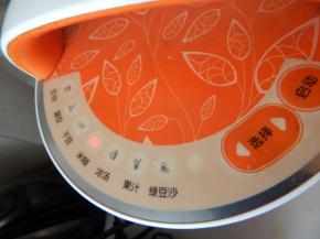 盖上豆浆机，按米糊功能