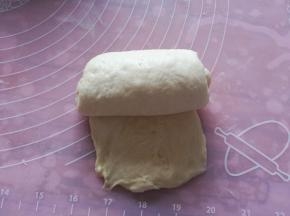 翻面，从上往下卷起。