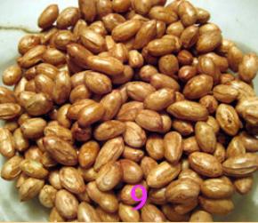 继续将花生米高火打2分钟，取出搅拌；