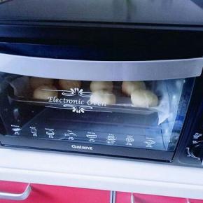 放入烤箱二次发酵，约20分钟左右.面包是原来的两倍大，即为二次发酵完成。