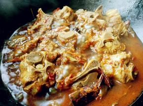 熟透后，打开锅盖，大火收汁