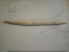  从上到下卷，两头捏紧，