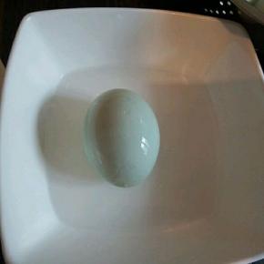 鸭蛋白酒碗里滚一圈，