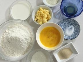 准备好所需食材： 高筋面粉360克，牛奶185克，全蛋液75克，奶粉15克，糖50克，盐4克，酵母6克，蜂蜜24克，黄油50克。

