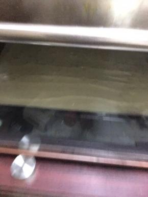 用搅拌棒刮平，震两下，放入预热好的烤箱，130度15分钟，我的烤箱温度比较高，大家可以适当调高30度