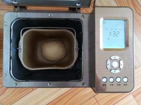 收圆面团，选择面包机发酵20分钟