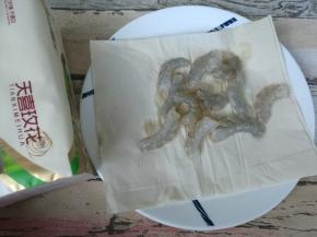 放在纸巾上吸干水分。