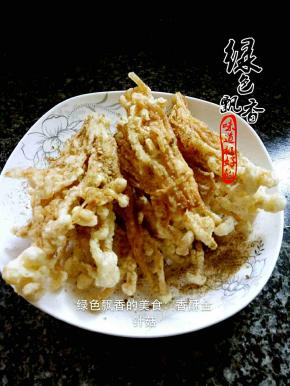 捞出，控油，撒上孜然粉，芝麻碎