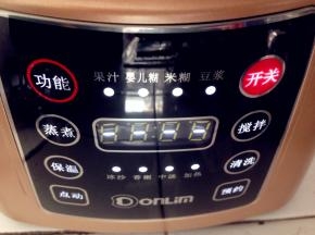 轻触开关键，再按功能键，选择到“米糊”功能，再按开关键