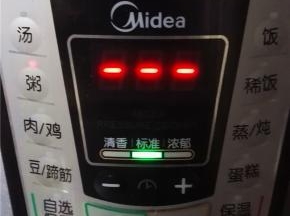 盖上压力锅盖，选择“粥”键，启动